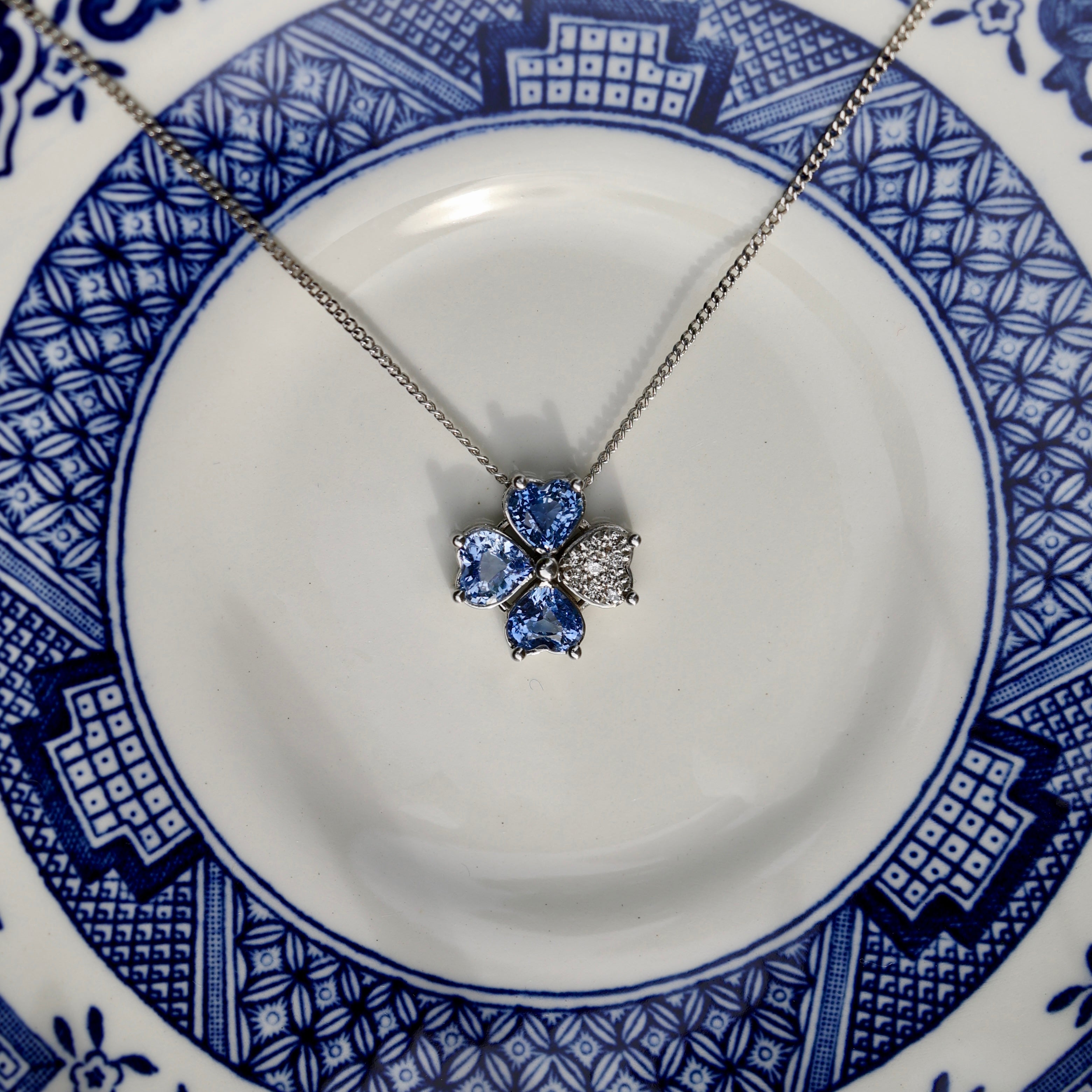 NATURAL BLUE SAPPHIRE & DIAMOND CLOVER PENDANT IN WHITE GOLD