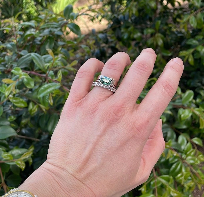 Nature's Geometry | An Emerald-Cut Teal Sapphire Solitaire Crafted in 18Kt White Gold