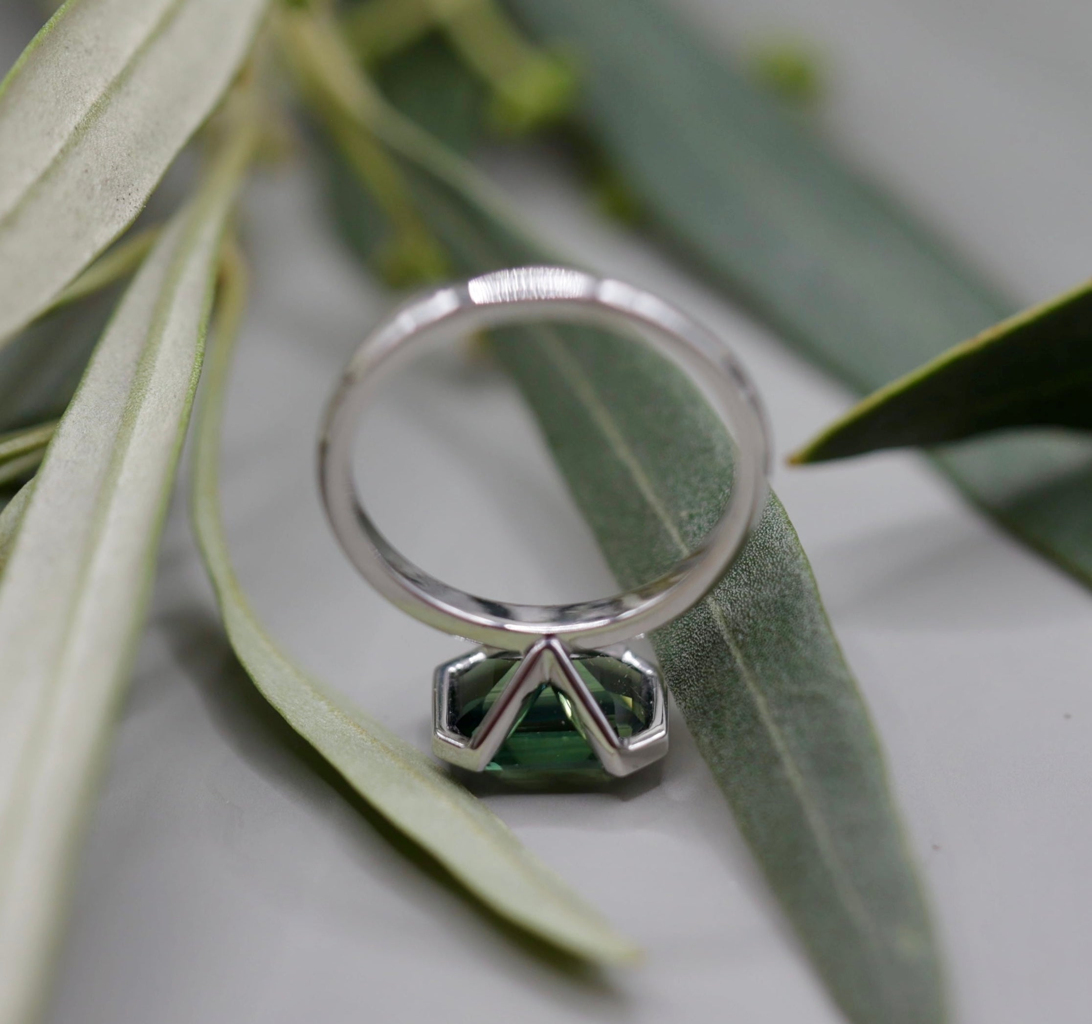 Nature's Geometry | An Emerald-Cut Teal Sapphire Solitaire Crafted in 18Kt White Gold