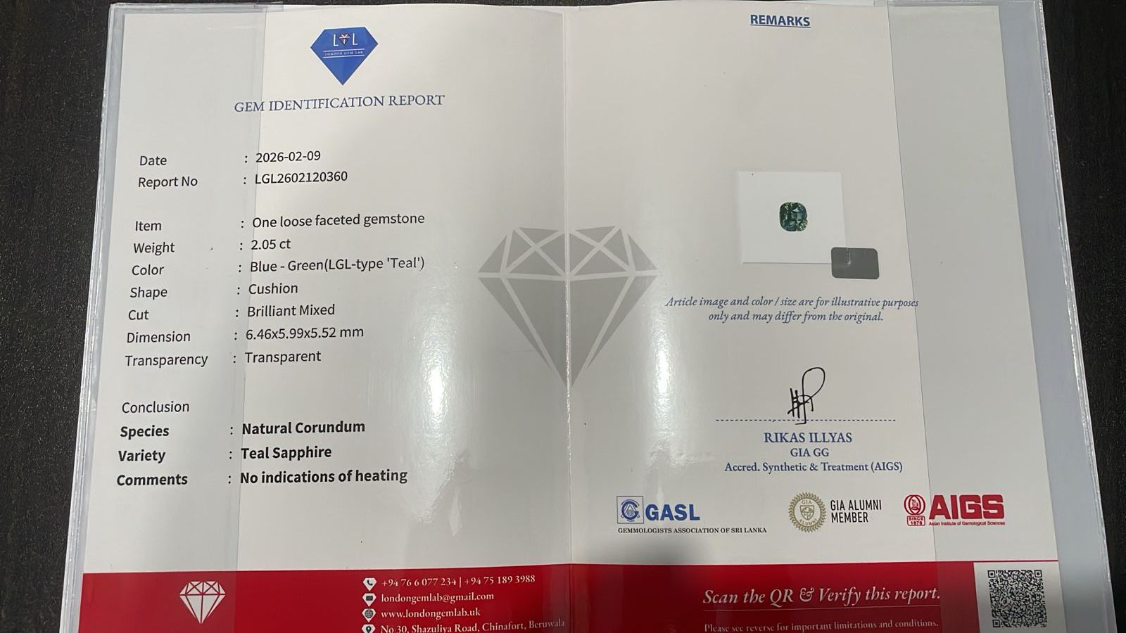 Gem identification report with diamond illustration and certification logos on a white background